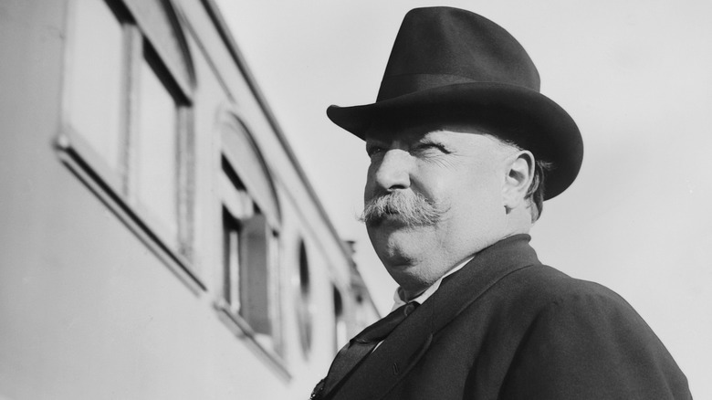 President William Howard Taft wearing black hat