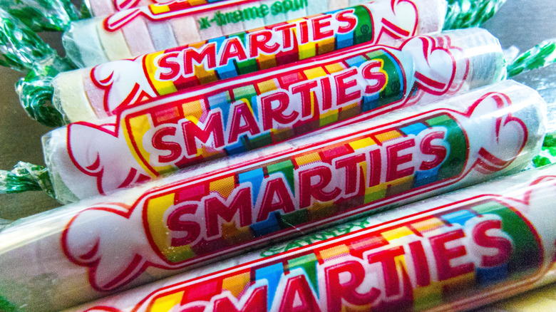 Rolls of Smarties next to each other