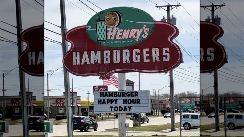 Henry's Hamburgers restaurant sign and special