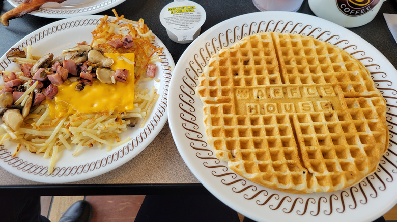 Waffle House hash browns next to a waffle