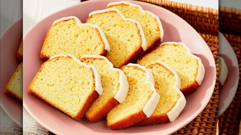 Slices of Walmart's Marketside Lemon Cake on a pink plate