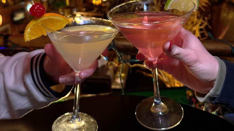 People cheersing drinks at Foster's Main Street Tavern