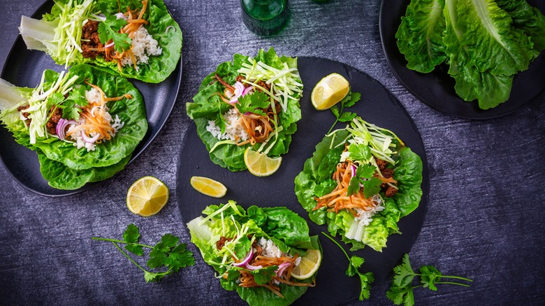 chicken lettuce cups on two plates