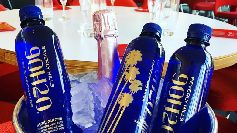 Bottles of 9OH2O in ice bucket
