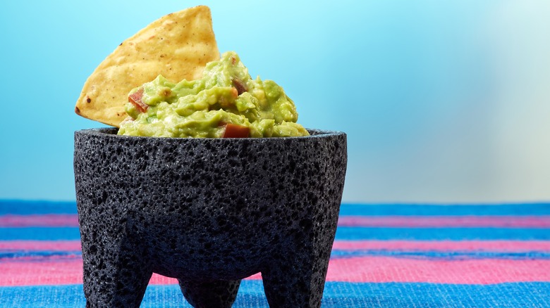 Guacamole served in a molcajete