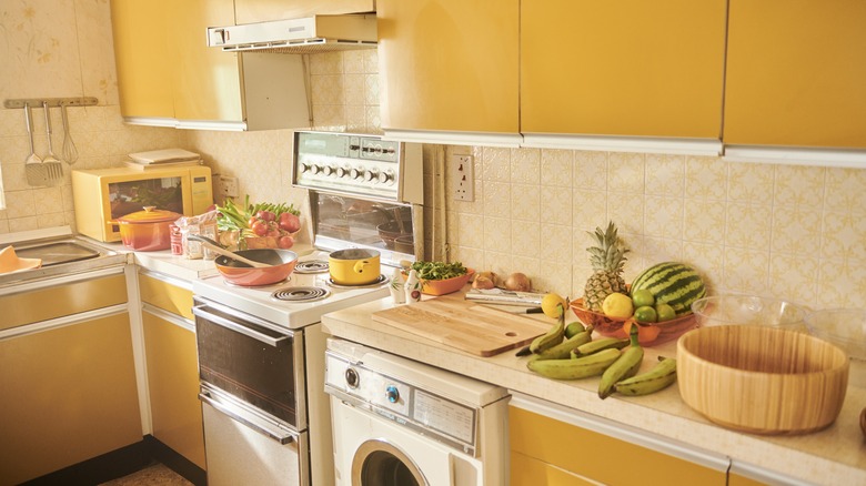 Kitchen with sunny yellow cabinets