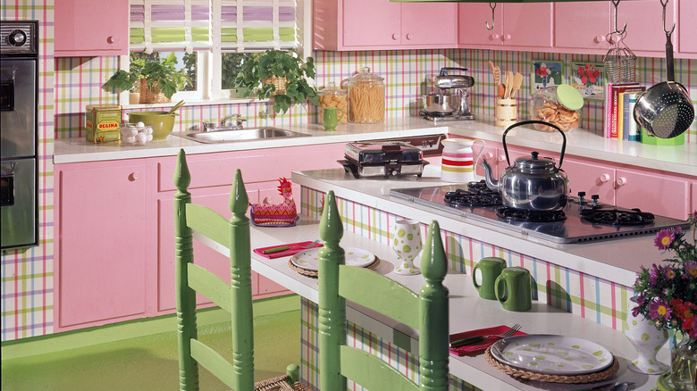 Pink kitchen with colorful plaid wallpaper