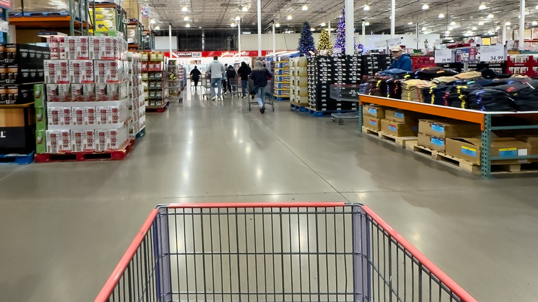 Behind shopping cart view of a Costco wholesale club aisle