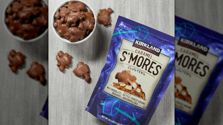 A bag of Kirkland Signature Caramel S'mores Clusters sits next to a bowl of the treats