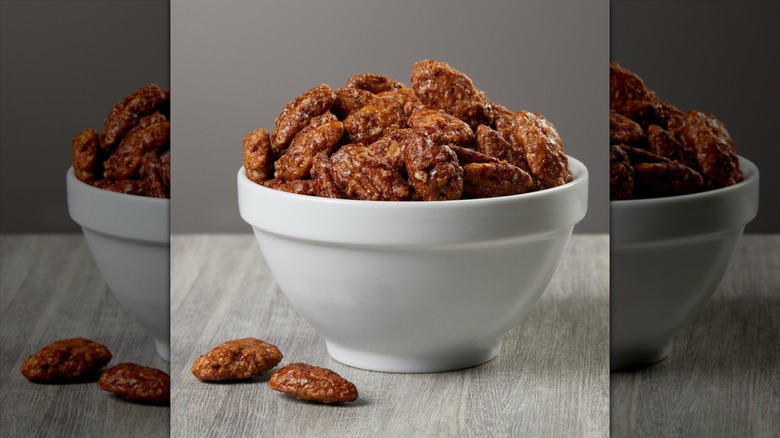 Kirkland Signature Praline Pecans in a white bowl.