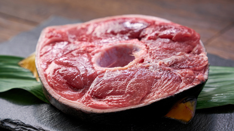 Raw bluefin tuna tail.