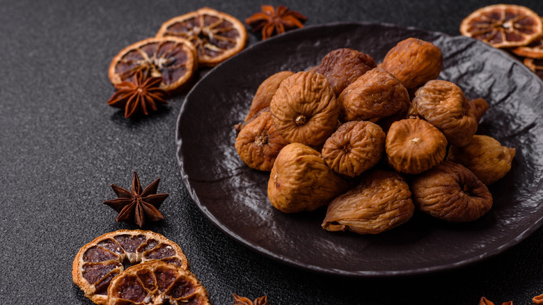 A bowl of dried figs.