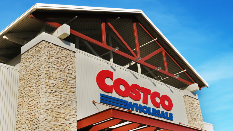 costco storefront with costco sign against blue sky