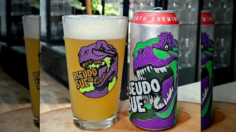 A can of Pseudo Sue Pale Ale poured into a glass.