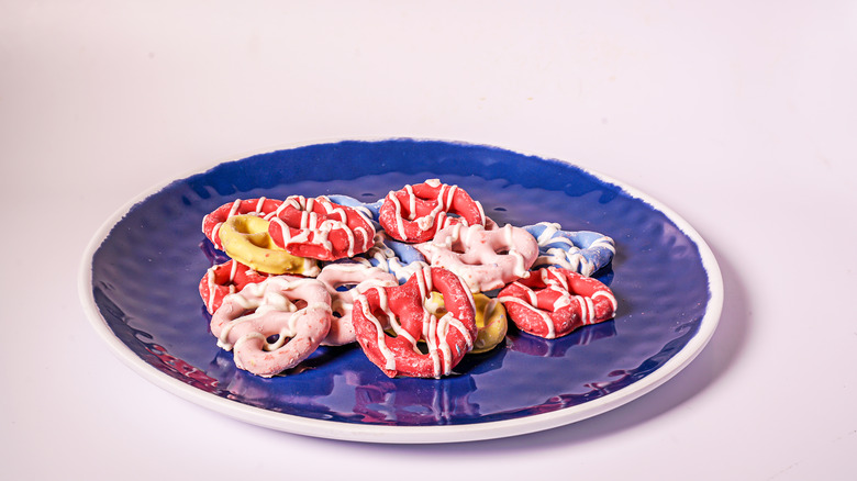 Yogurt coated pretzels on a plate