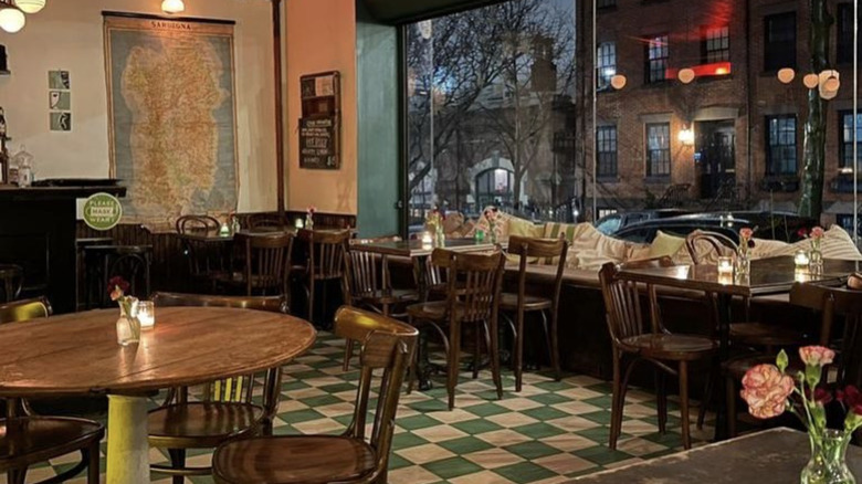 A dining room is decorated with an old map.