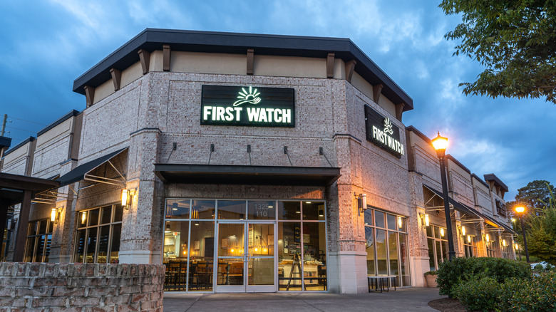 First Watch restaurant exterior at dusk