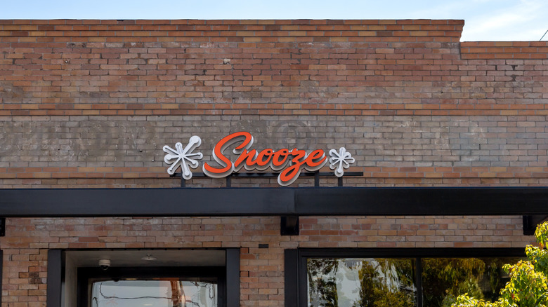 The exterior of a Snooze restaurant
