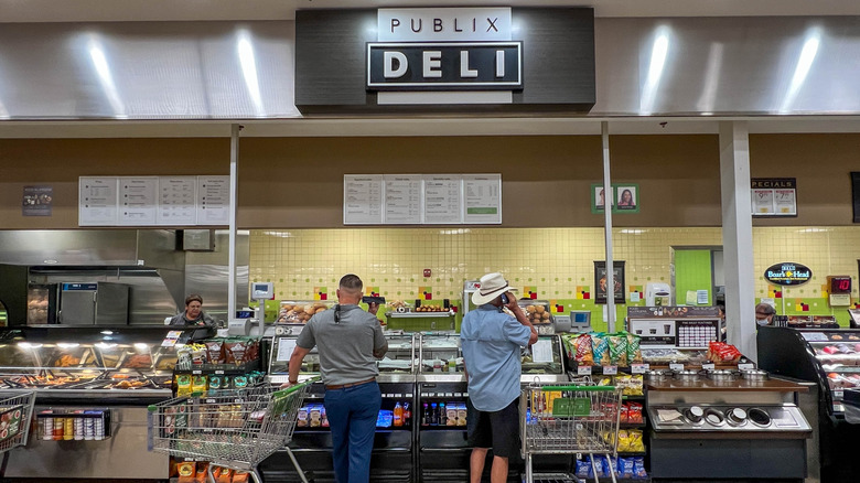 Customers waiting at the deli in a Publix