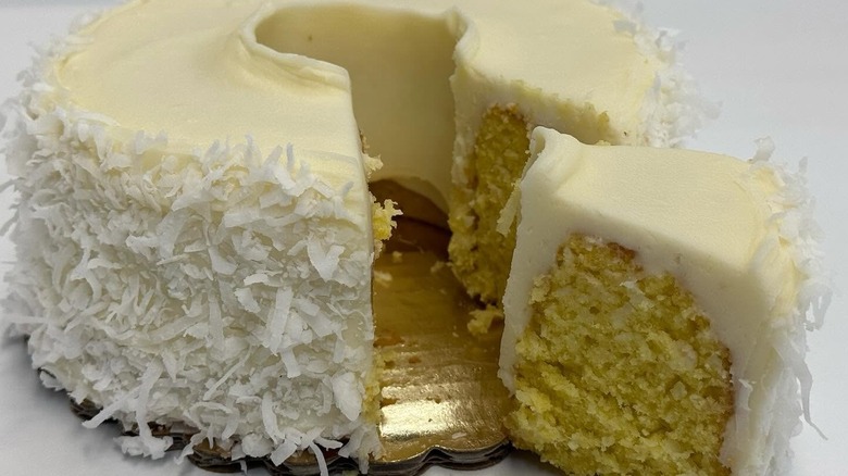 Close-up of Weber's Lemon Coconut Ring Cake with cream cheese icing
