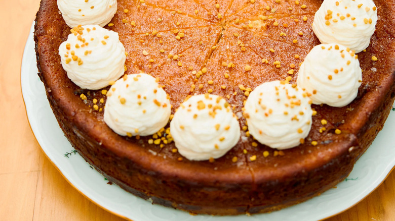 A Zoomed-in shot of Welton's signature honey pie laid on a piece of china and ready to serve