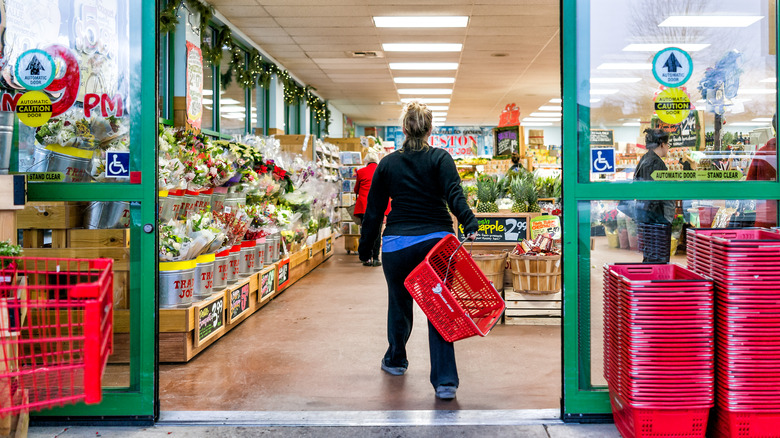 Person walking into Trader Joe's