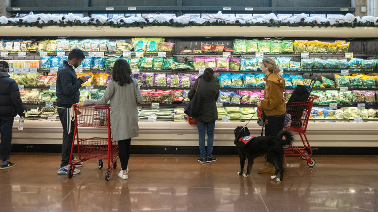 People shopping inside Trader Joe's