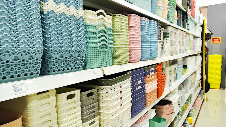 Storage baskets are displayed on a store shelf