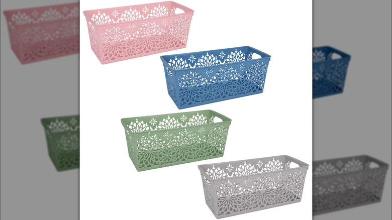 Daisy Design Laser-Cut Plastic Storage Bins from Dollar Tree are shown in pink, blue, green, and gray