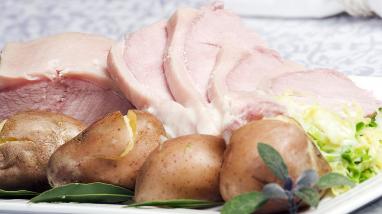 Traditional Irish boiled bacon and cabbage with potatoes