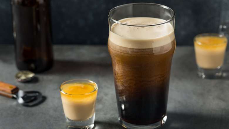 A Guinness and a shot of Bailey's, the makings of an Irish car bomb, since on a table
