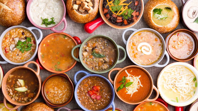 Overhead view of many different types of soup