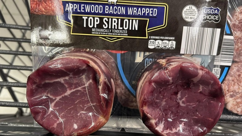 Cattlemen's Ranch USDA Choice Applewood Bacon Wrapped Top Sirloin in an Aldi cart.