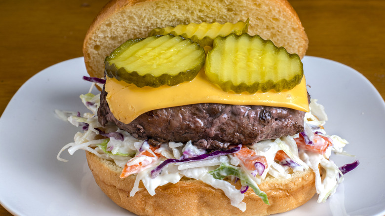 burger garnished with coleslaw