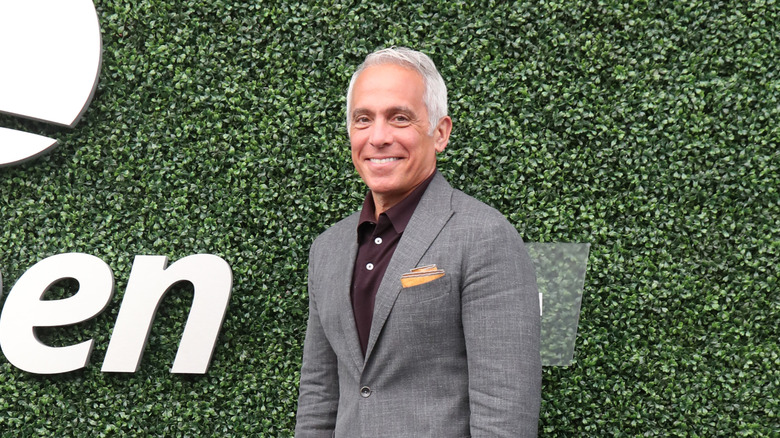Geoffrey Zakarian smiles at an event.