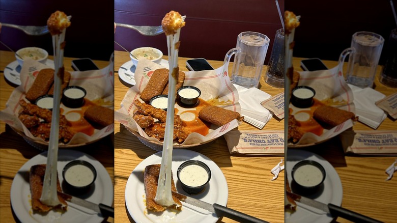 A Chili's Fried Mozzarella shows surprising elasticity when pulled