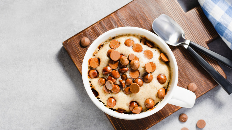 Mug cake with peanut butter chips on top
