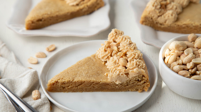 slice of peanut butter cookie cake with frosting