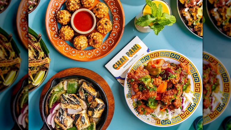 Selection of different menu items and drinks offered at Chai Pani.