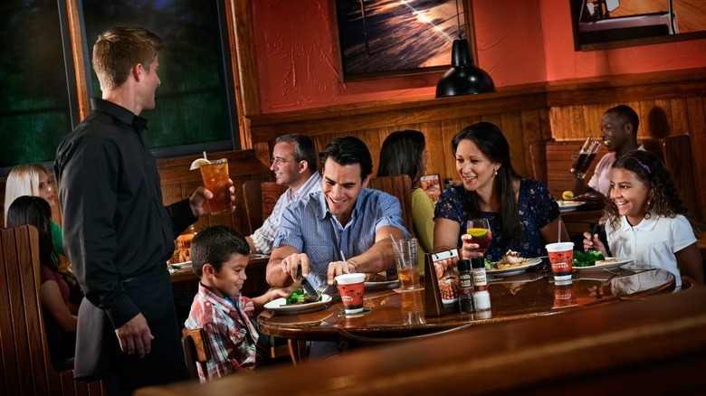 Family eating at Outback steakhouse