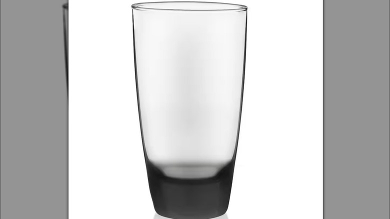 A highball glass with a smoky hue