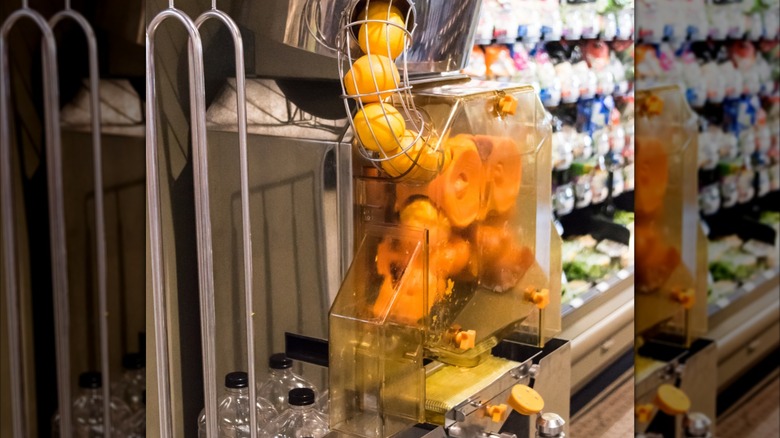 Orange juicer at grocery store