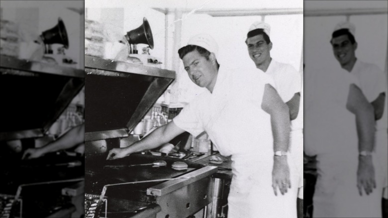 Black-and-white photo of longtime In-N-Out Burger employee Bob Lang Sr. and another worker in a restaurant kitchen