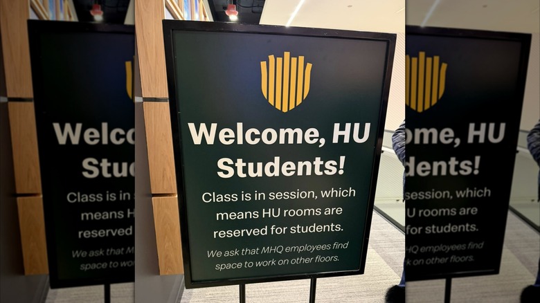A sign welcomes students to Hamburger University.