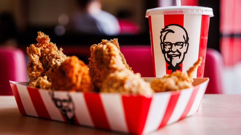 KFC fried chicken and a drink at a restaurant.