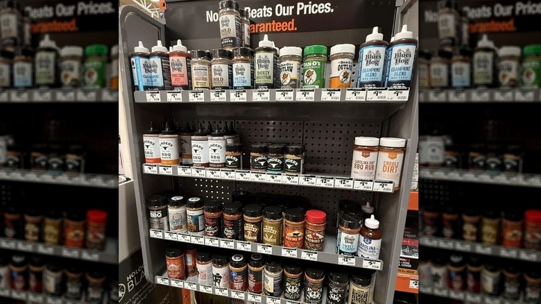 Barbecue seasonings and sauces on display at Home Depot.