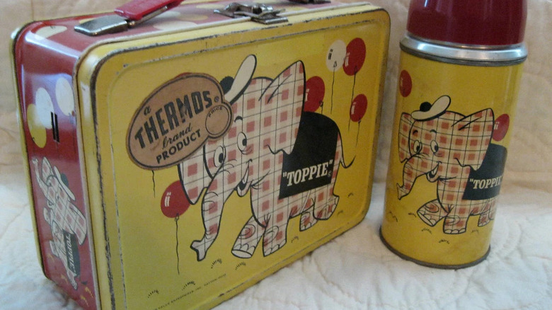 A 'Toppie' metal lunch box and matching thermos
