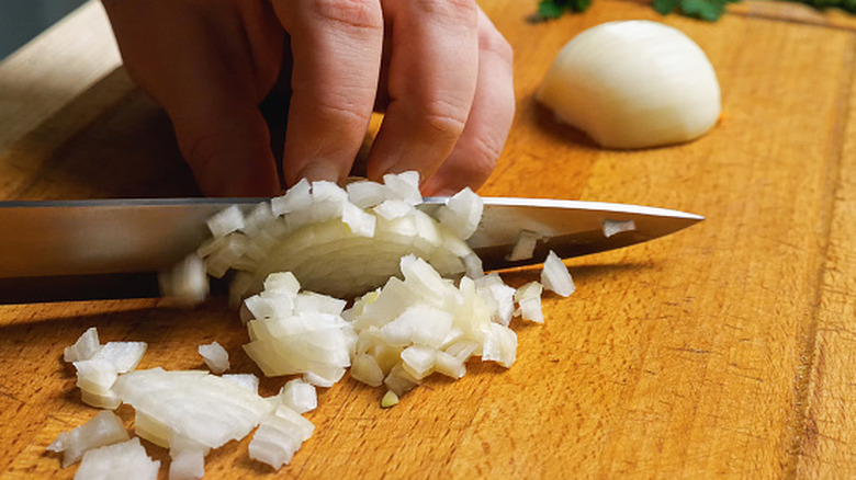 A close-up of diced onions.