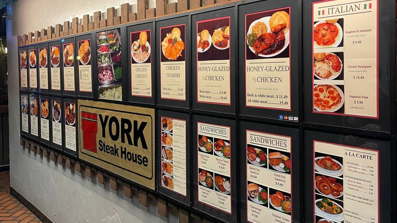The menu options are visible on a wall at York Steak House