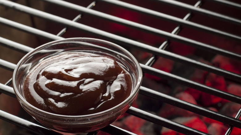 Barbecue sauce pictured on grill.